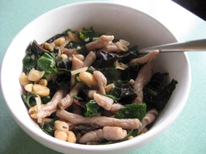 pasta in broth with greens, white beans and shallots